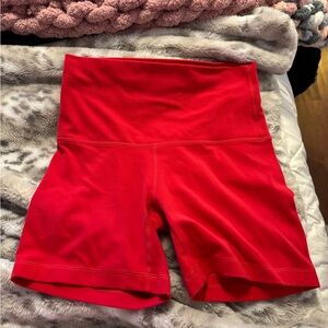 Aritzia butter shorts in dark pink